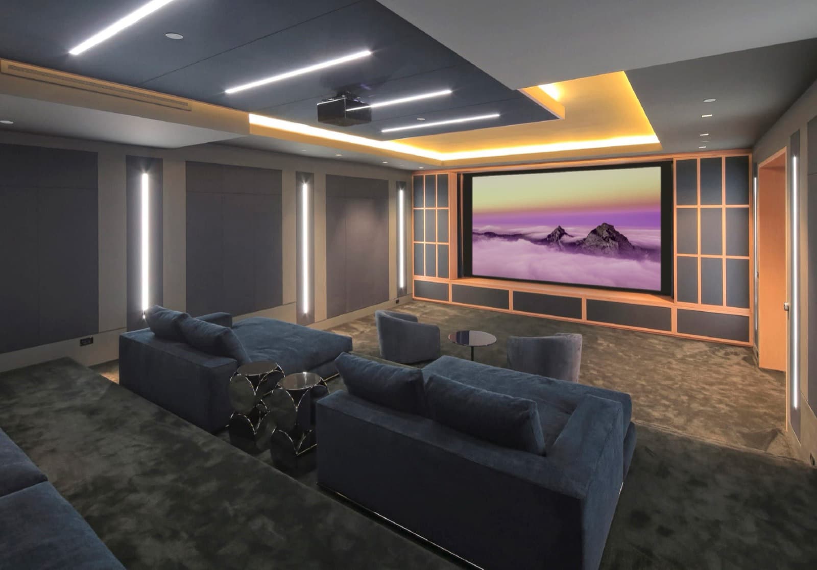 Home cinema con pantalla y butacas reclinables